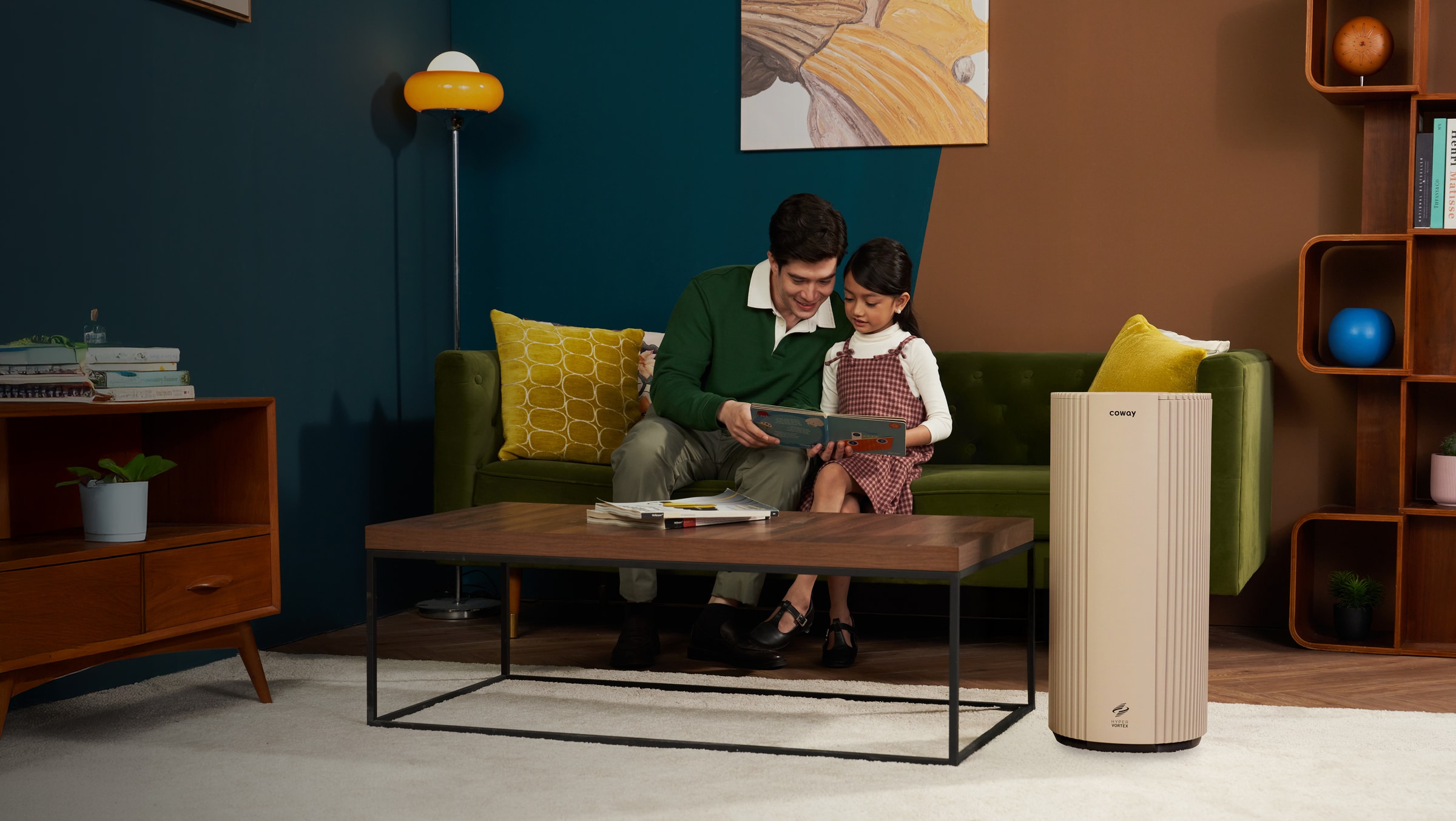 Coway Suite air purifier in a warm family living room